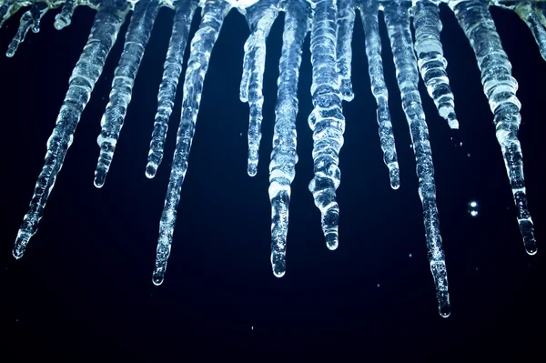 Icicles at night — Stock Photo, Image