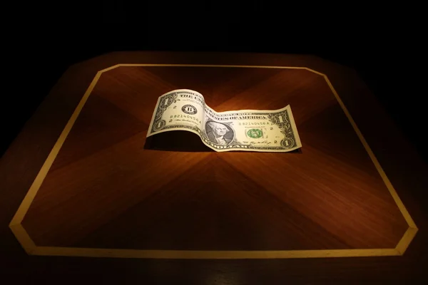 Подсвеченный доллар — стоковое фото