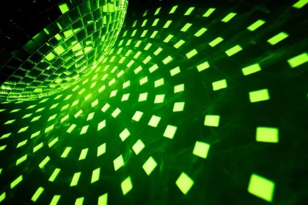 Disco ball with green illumination — Stock Photo, Image