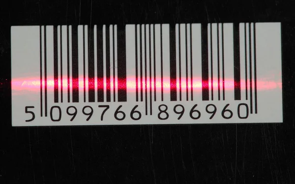 Código de barras com faixa laser vermelha — Fotografia de Stock