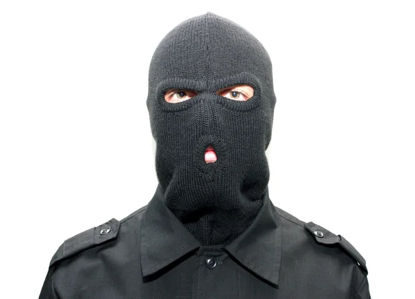 Um ladrão usando uma máscara de esqui (balaclava ) — Fotografia de Stock
