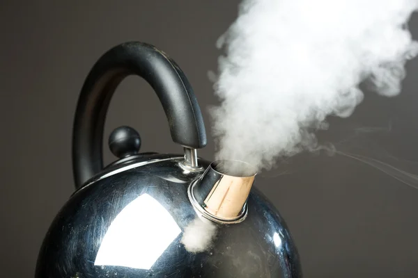 Boiling kettle with dense steam — Stock Photo, Image