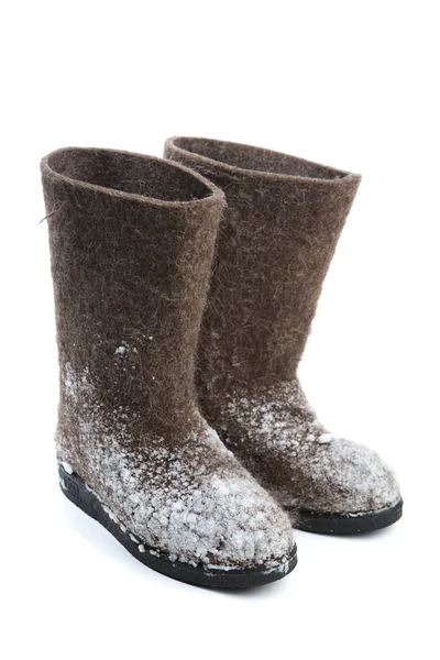 Stivali di feltro con neve isolata su bianco — Foto Stock