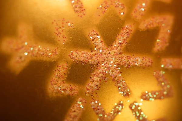 Texture of yellow christmas decoration, closeup — Stock Photo, Image