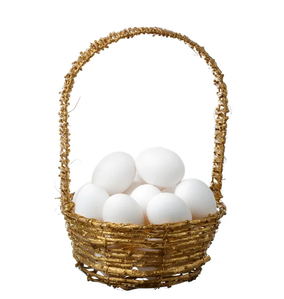 Ovos em cesta de ouro — Fotografia de Stock