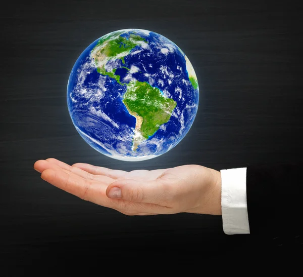 Globe on the hand — Stock Photo, Image