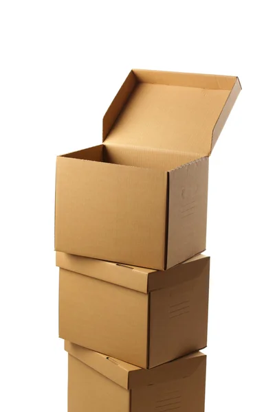 Stack of closed cardboard boxes isolated — Stock Photo, Image