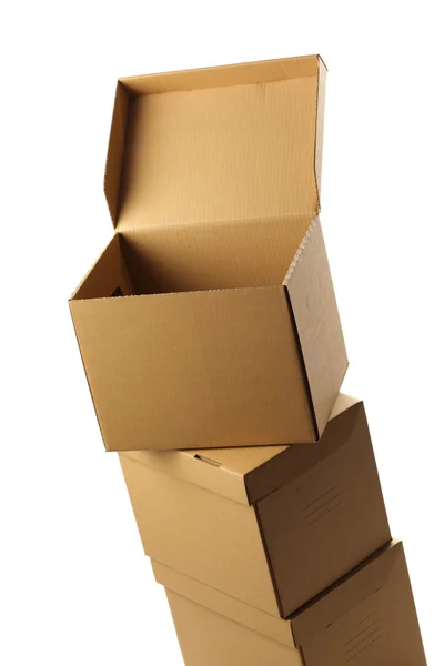 Stack of opened cardboard boxes, isolated — Stock Photo, Image