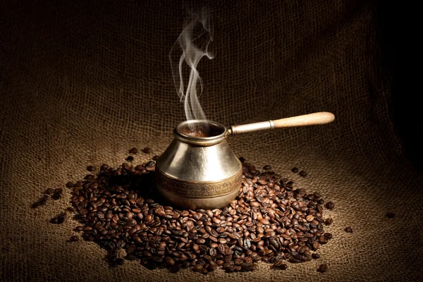 Old coffee pot with smoke — Stock Photo, Image