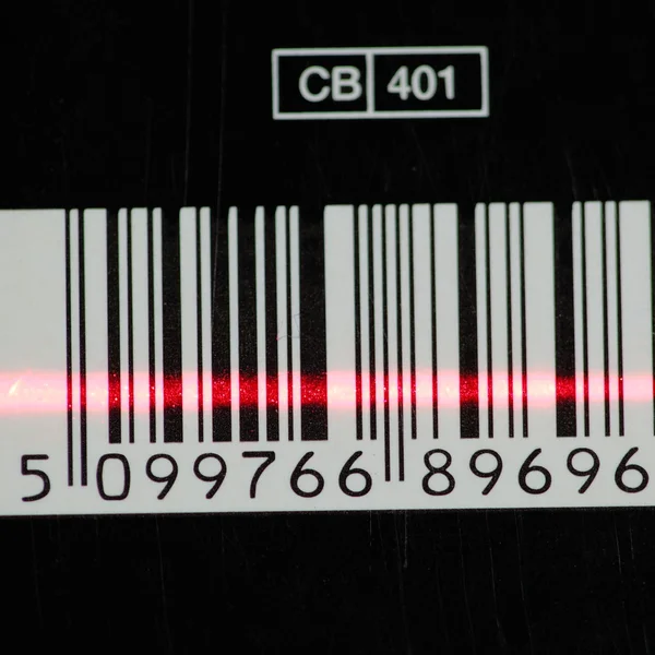 Código de barras com faixa laser vermelha — Fotografia de Stock