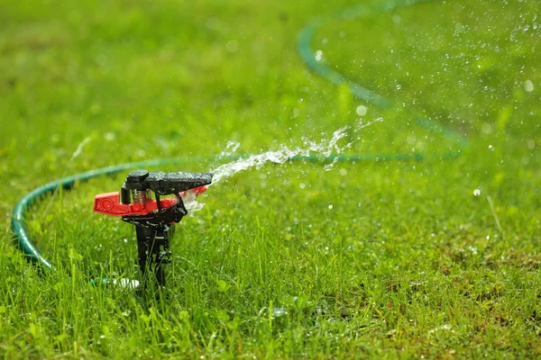 stock image Closeup of lawn sprinkler with copyspace
