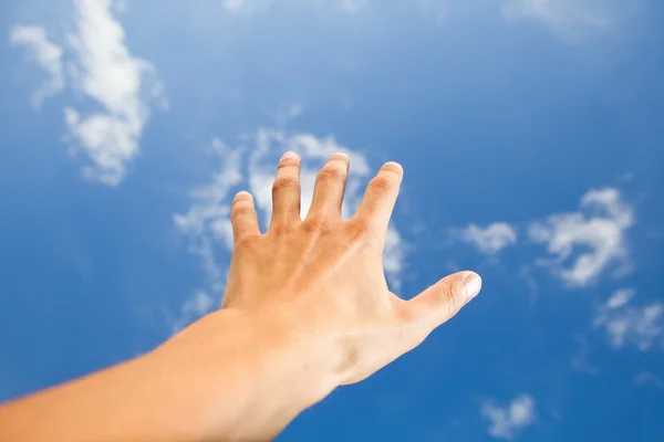 Mâna atinge cerul — Fotografie, imagine de stoc