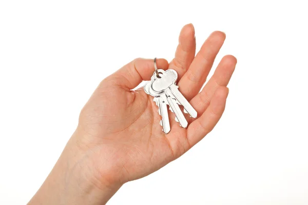 Un mazzo di chiavi sul palmo della mano — Foto Stock