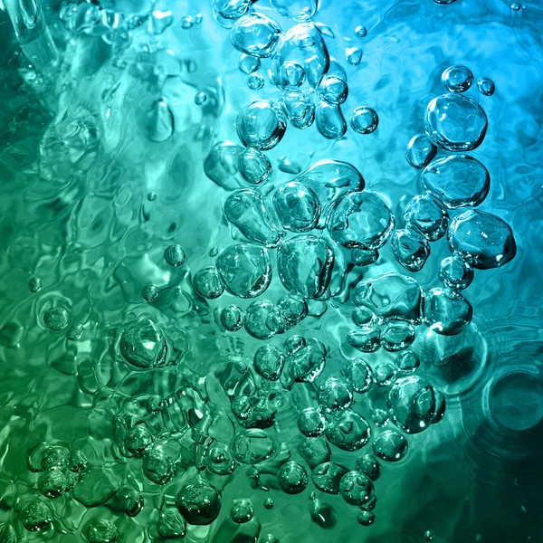 Abstraktní modrou vodu s bublinkami — Stock fotografie