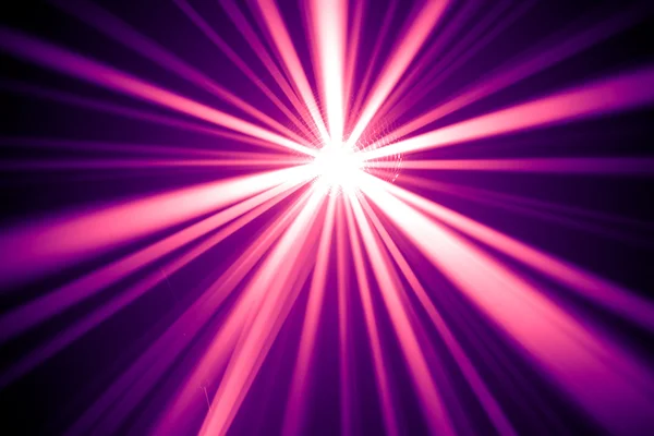Фиолетовые диско-лучи — стоковое фото