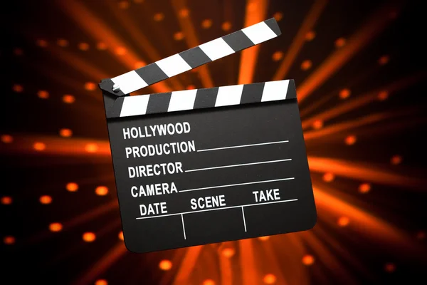 Clapperboard against shiny background — Stock Photo, Image