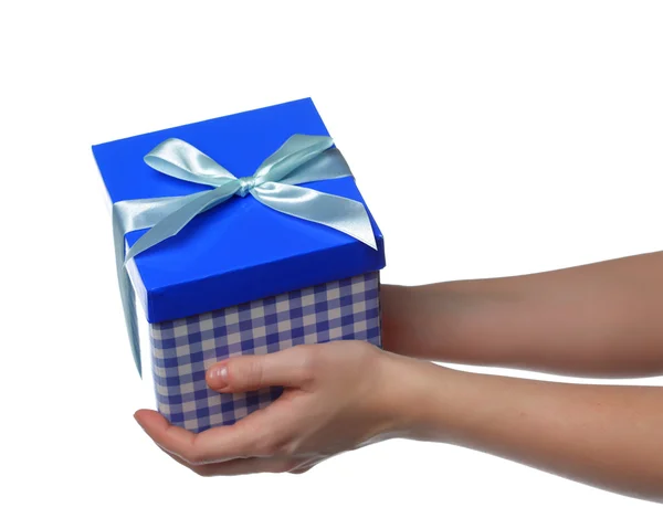 Hands holding a gift — Stock Photo, Image
