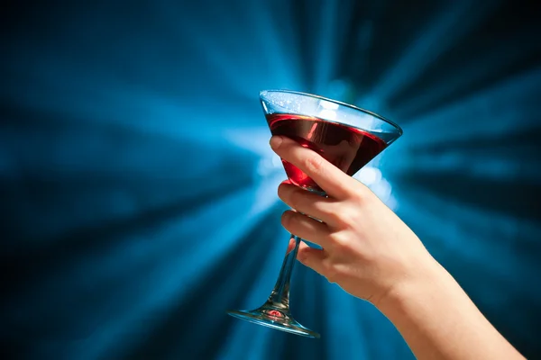 Hand holding alcohol — Stock Photo, Image