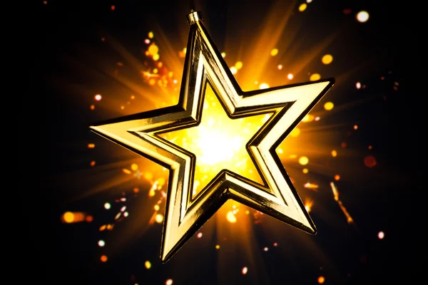Glänzender goldener Stern — Stockfoto