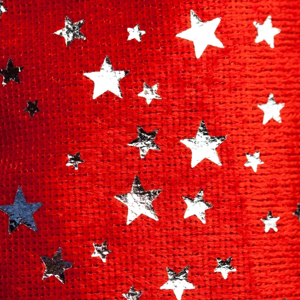 Kırmızı noel yıldızlarının arka planı — Stok fotoğraf