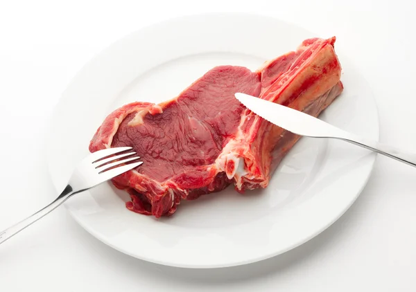 Place setting with fresh meat — Stock Photo, Image