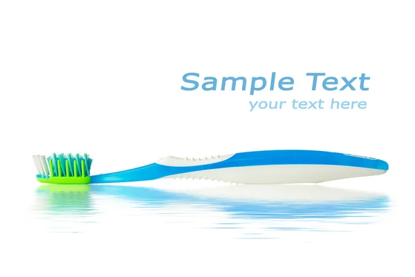 stock image Toothbrush with water reflection and copy-space