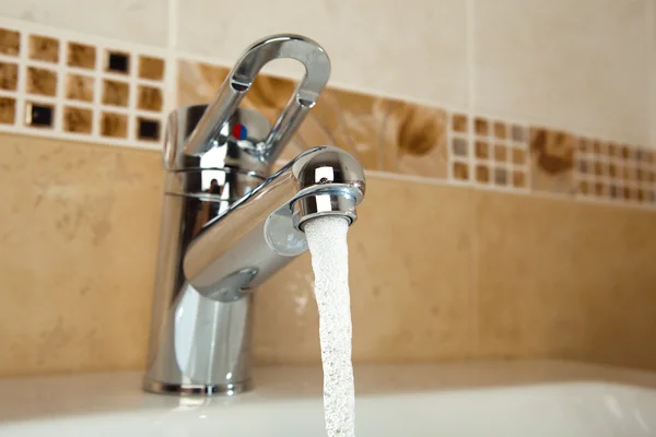 Mixer tap in use — Stock Photo, Image
