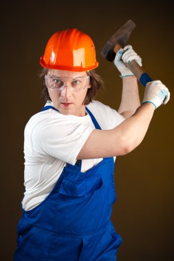 Worker holding a hammer clipart