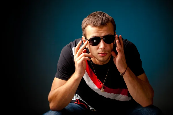 stock image Cool guy try on sunglasses