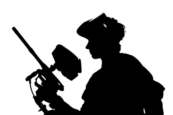 Silhouette of a paintball shooter isolated on white — Stock Photo, Image