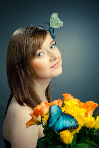 stock image Beautiful young woman and butterfly