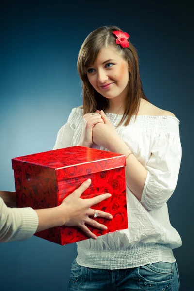 stock image Beautiful girl receives a gift