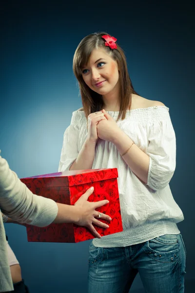 stock image Beautiful girl receives a gift