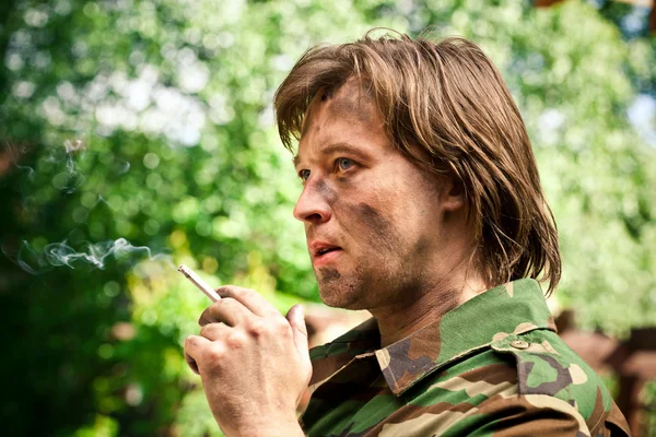 Smoking soldier — Stock Photo, Image