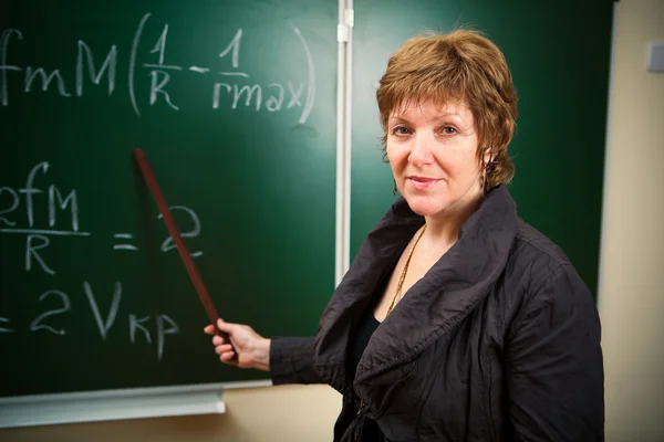 Učitelka matematiky s ukazatelem — Stock fotografie