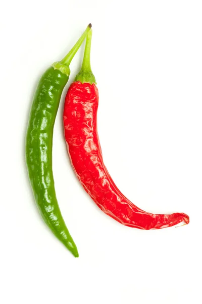 Red and green chili peppers — Stock Photo, Image