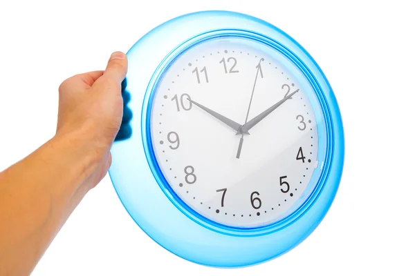 Hand holding blue office clock — Stock Photo, Image
