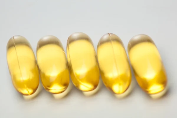 Omega-3 fish fat oil capsules — Stock Photo, Image