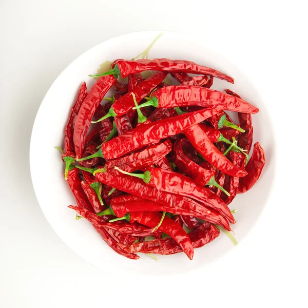 Red chili peppers on the plate — Stock Photo, Image