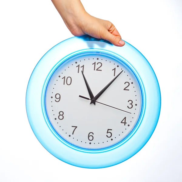 Hand holding office clock — Stock Photo, Image