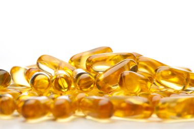 Omega-3 fish fat oil capsules clipart