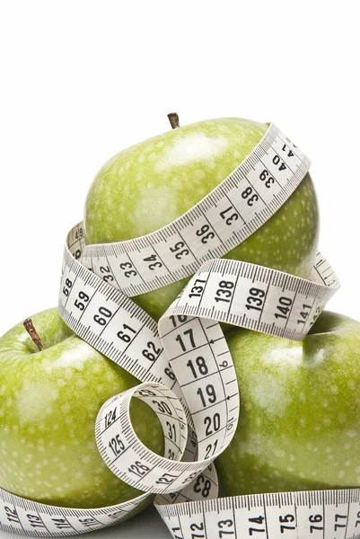 Centimetrů a jablka. — Stock fotografie