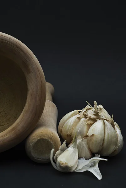 stock image Garlic mortar and pestle.