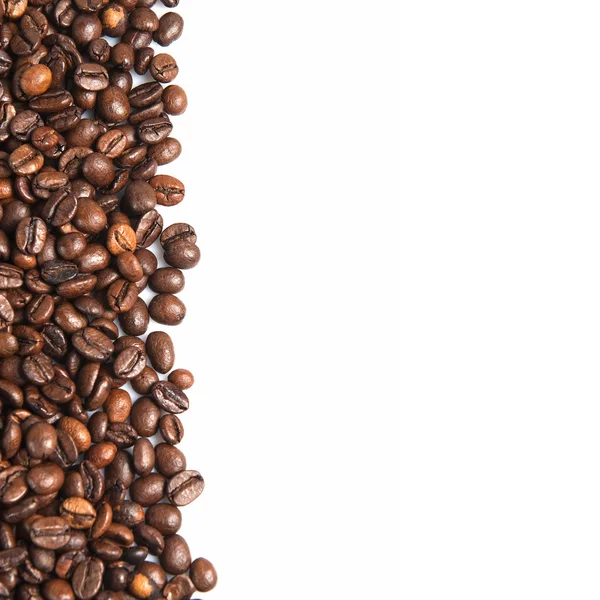 Kaffebönor och en kopia utrymme. — Stockfoto