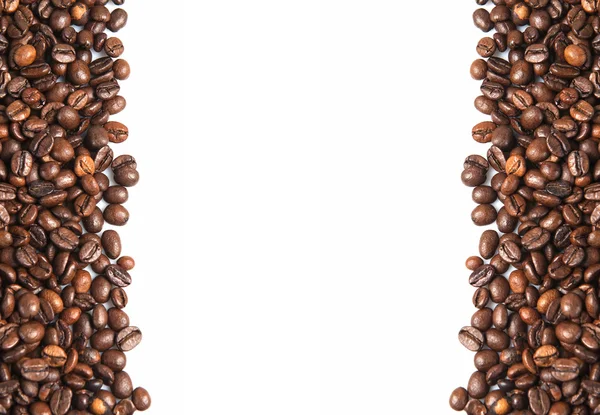 Kaffebönor och en kopia utrymme. — Stockfoto
