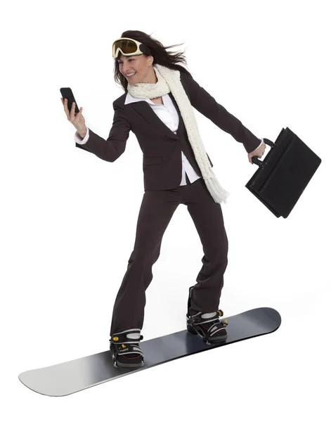 Empresaria en una tabla de snowboard — Foto de Stock