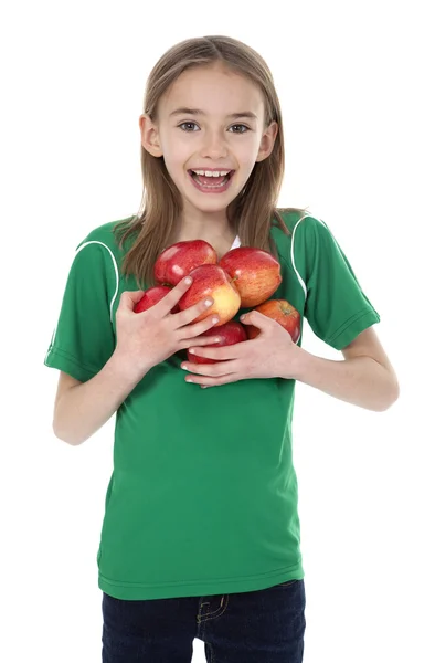 Roztomilá malá holka hospodářství jablka — Stock fotografie