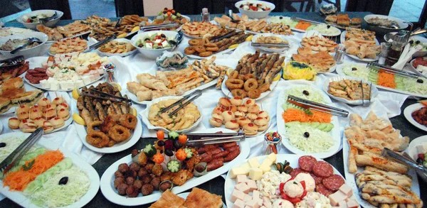 Mesa de comida gourmet — Fotografia de Stock