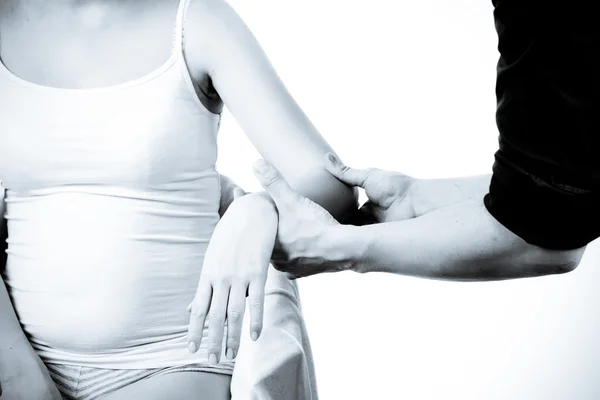 Massage therapist giving a massage. female receiving professiona — Stock Photo, Image