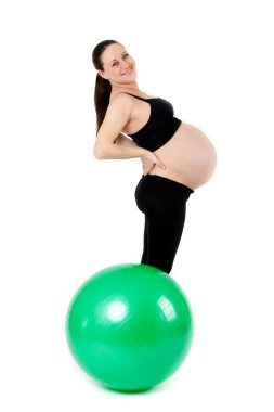 hamile kadın excercises jimnastik topu ile. güzel pregnan